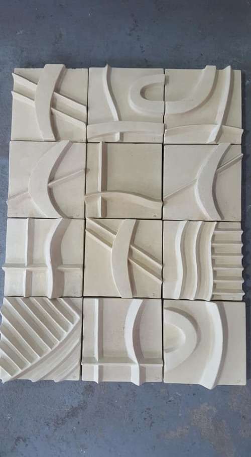 Unique plastered finish/cement type material. Wall hanging--great appeal,funky,modern!!