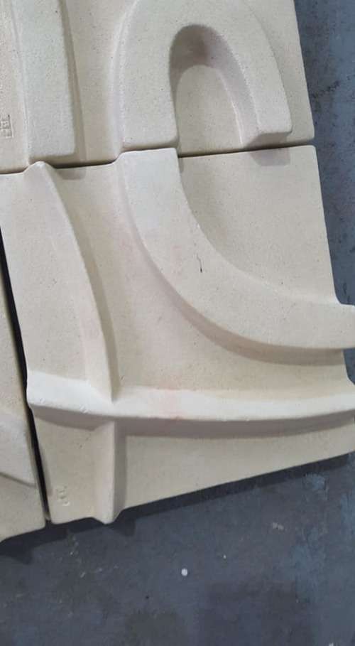 Unique plastered finish/cement type material. Wall hanging--great appeal,funky,modern!!