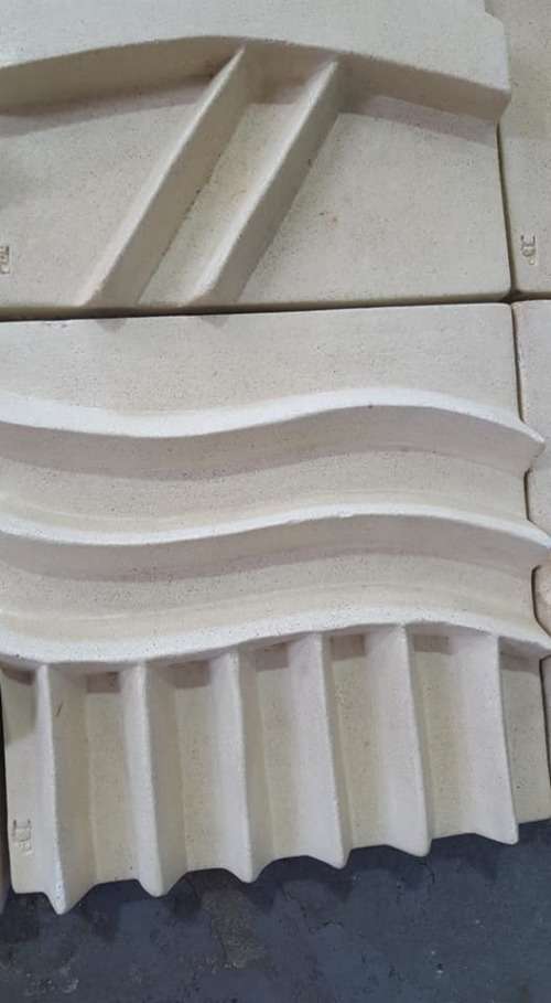 Unique plastered finish/cement type material. Wall hanging--great appeal,funky,modern!!