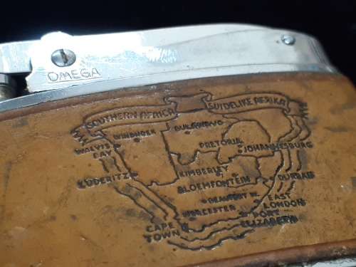 Omega engraved lighter