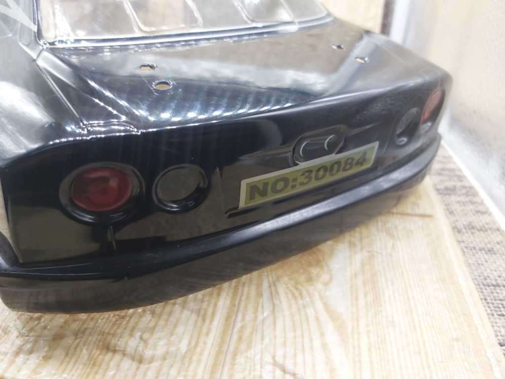 SUPER RACING CAR-- COMES WITH 2 SHELLS- REMOTE--BMW AND SKYLINE BODY 35 cm x 18cm