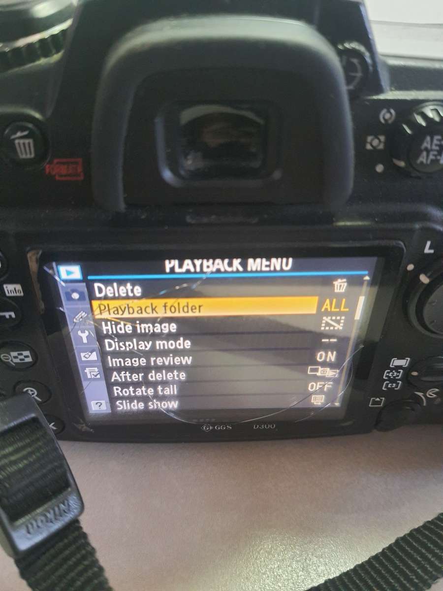 #16 Nikon D3000 with AF Lens Battery and Charger - comes with carry bag