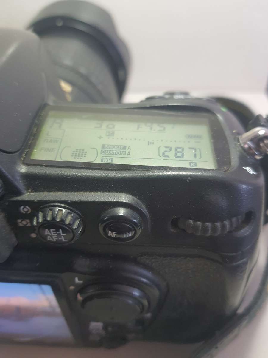 #16 Nikon D3000 with AF Lens Battery and Charger - comes with carry bag