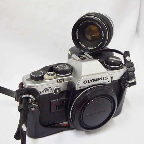Olympus OM10 camera body with Olympus OM - System Auto / S 1:1.8 lens - Not tested