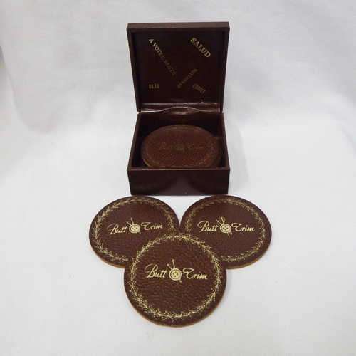 Set of 8 leather Butt Trim coasters in box
