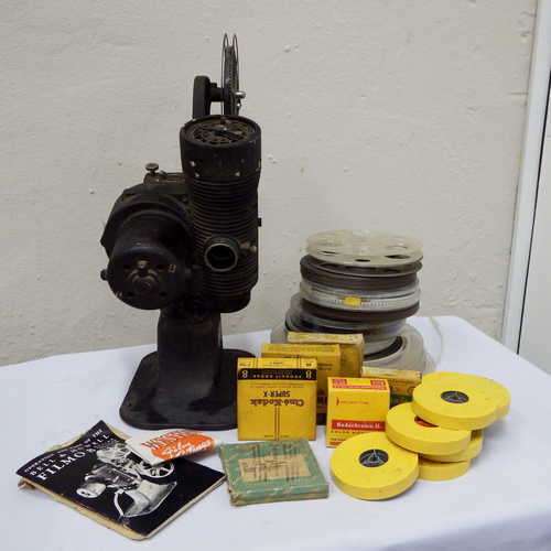 8mm Super X Bell & Howell Filmo 8 - Model 122-B Projector with 21 used & unused films