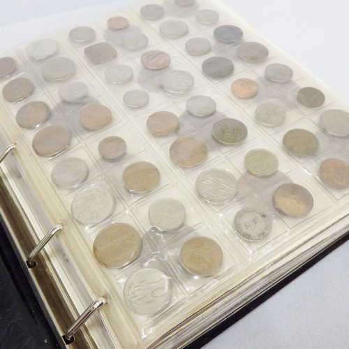 Coin album with 19 pages filled with different coins