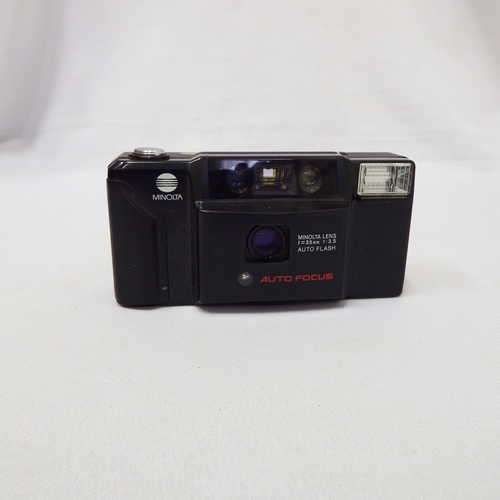Minolta AF-E auto-focus instant camera with built in flash