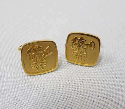 Pair of Boland Bank gold plated cufflinks