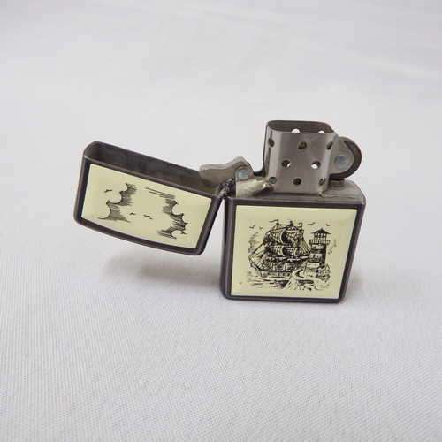 Enameled Zippo cigarette lighter with clipper ship & lighthouse detail