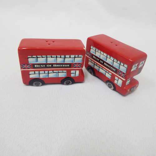 Pair of British Pottery Company salt and pepper busses - Chip on one of the busses