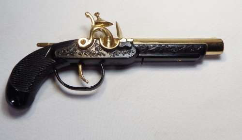 Vintage Derringer pistol shaped table lighter