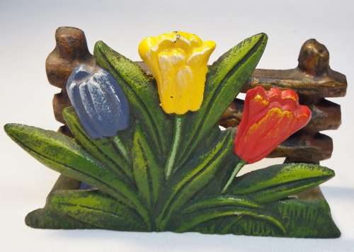 Vintage cast iron serviette stand with tulips