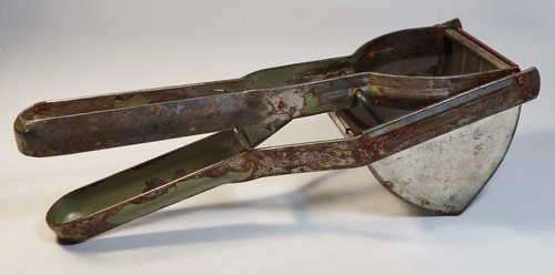 Vintage Swedish handheld potato masher