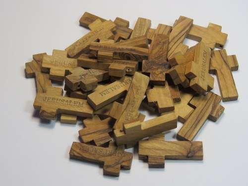 Bag with 30 crosses in Olive wood inscribed Jerusalem