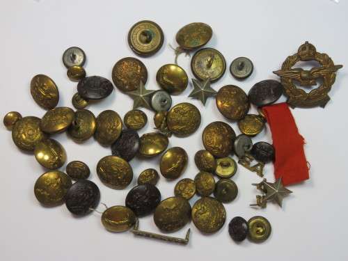 Lot of military buttons and badges