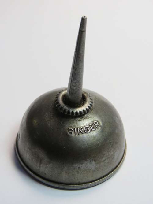 Small antiques Singer oil can