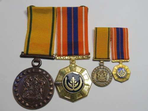 Pair of SADF and prison service medals and miniatures - See description