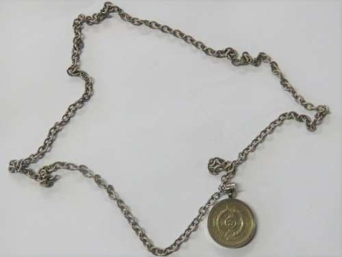 British one pound coin in sterling silver pendant with chain - Chain: 31cm