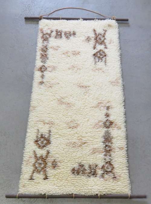 Genuine sheep wool wall hanging with tribal insignia - 109 x 53 cm