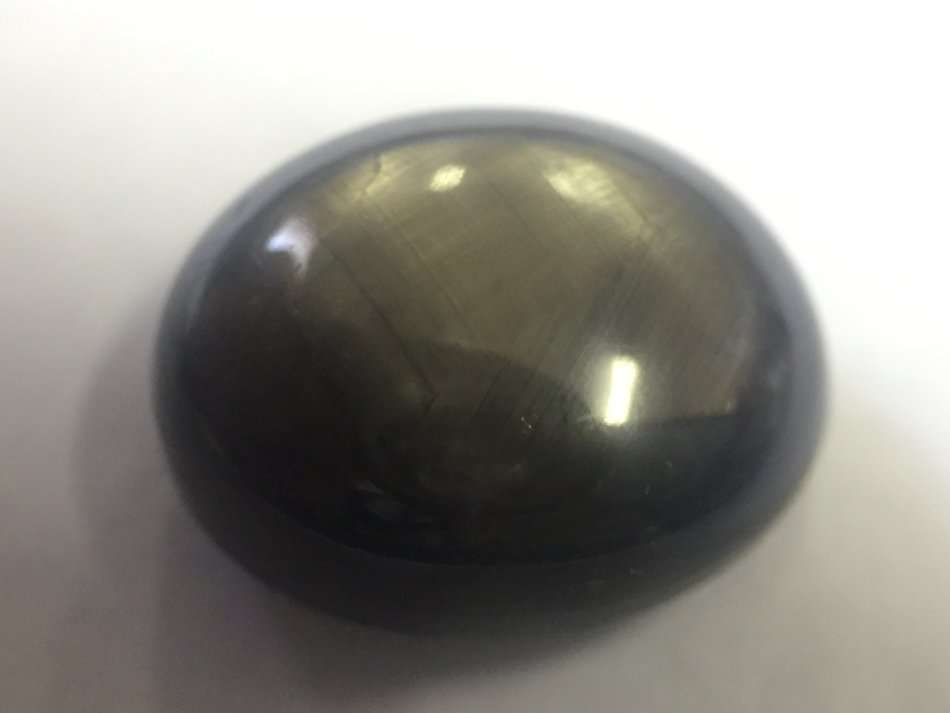 Natural star Sapphire of 15.594 carat - Oval cabachan greyish brown with Gemlab and GISA certificate