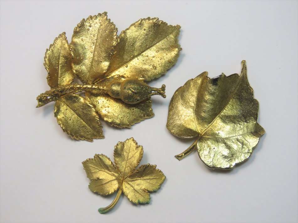 Lot of 3 goldplated leaf brooches