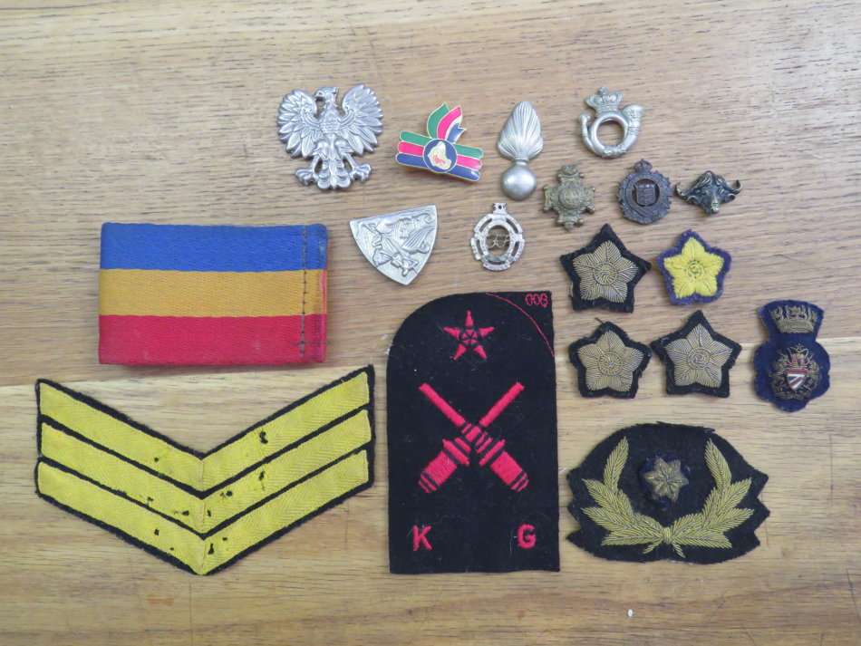 Large lot of military badges