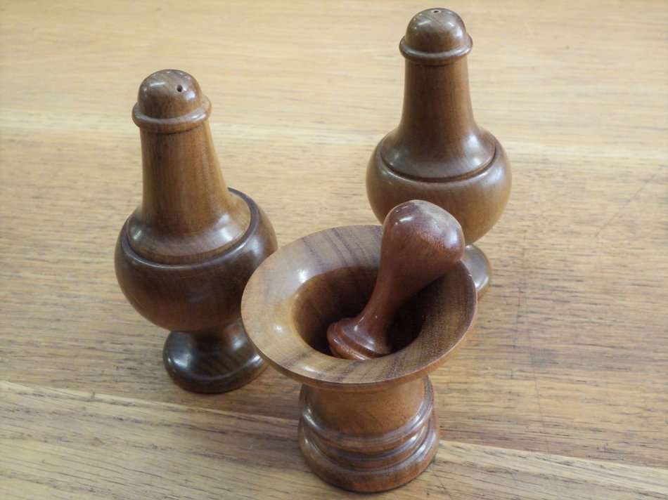 Handcrafted wooden salt and pepper shakers with mortar and pestle