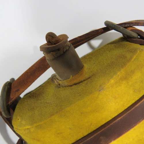 WW1 British Army water bottle with yellow cover and leather carrier