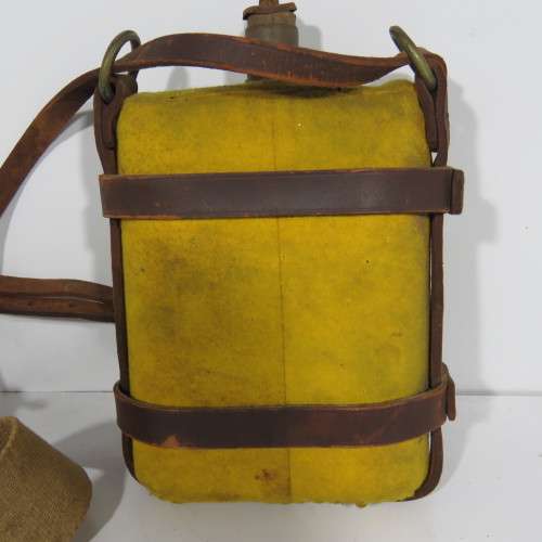 WW1 British Army water bottle with yellow cover and leather carrier