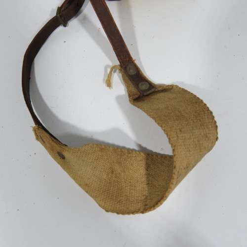 WW1 British Army water bottle with yellow cover and leather carrier