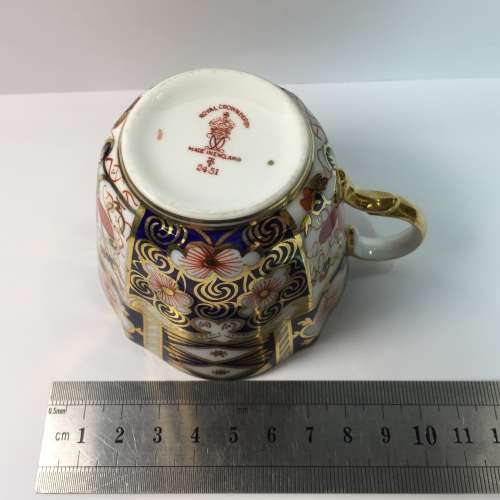 Royal Crown Derby porcelain trio with gold paint
