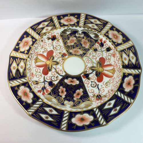 Royal Crown Derby porcelain trio with gold paint
