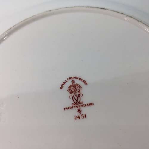 Royal Crown Derby porcelain trio with gold paint