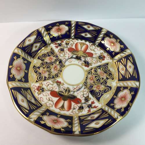 Royal Crown Derby porcelain trio with gold paint