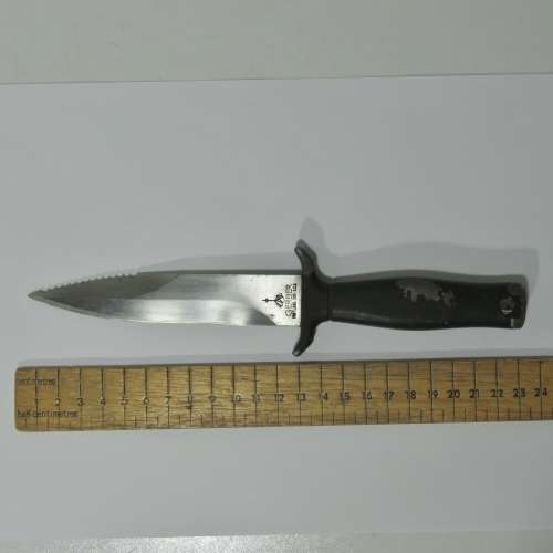 Vintage Gerber boot knife with leather sheath