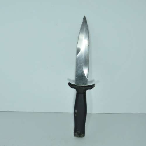 Vintage Gerber boot knife with leather sheath