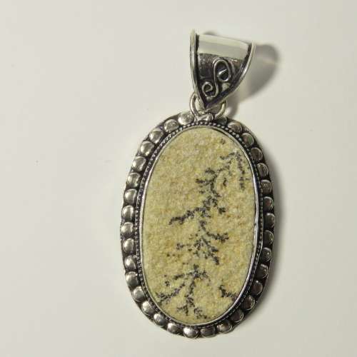 Sterling silver pendant with fossil inlay