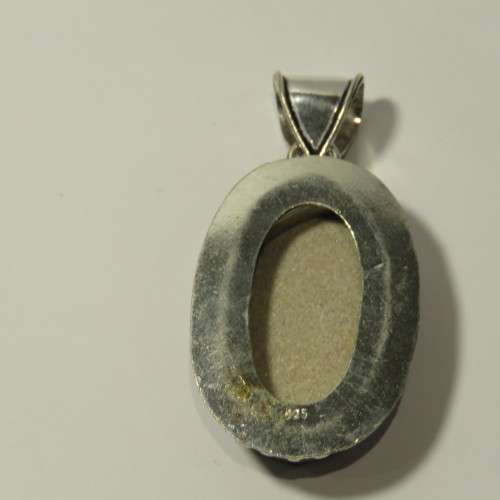 Sterling silver pendant with fossil inlay
