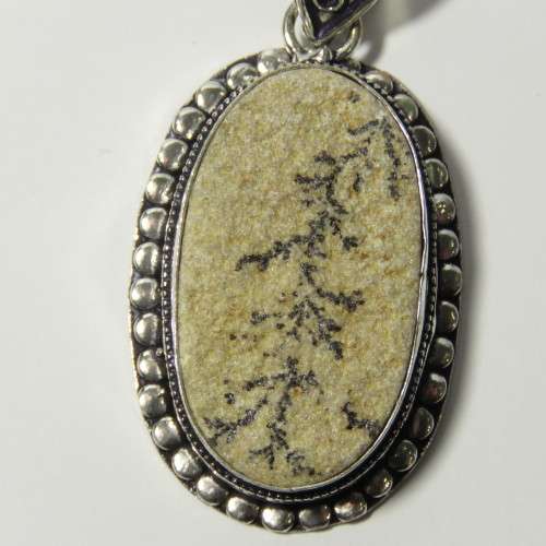 Sterling silver pendant with fossil inlay