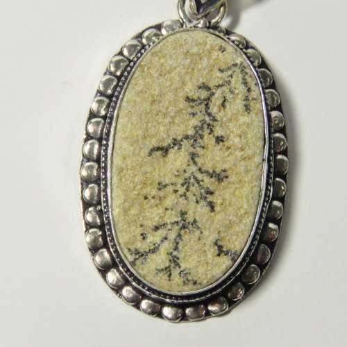 Sterling silver pendant with fossil inlay