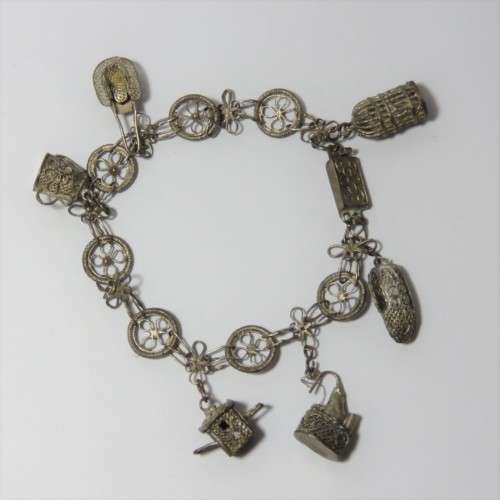 Low Grade silver filigree charm bracelet