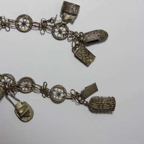 Low Grade silver filigree charm bracelet