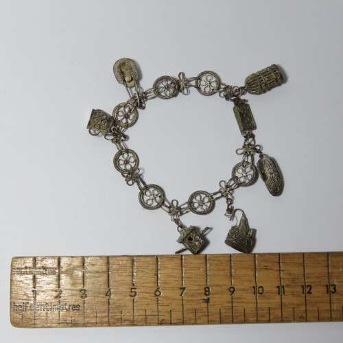 Low Grade silver filigree charm bracelet