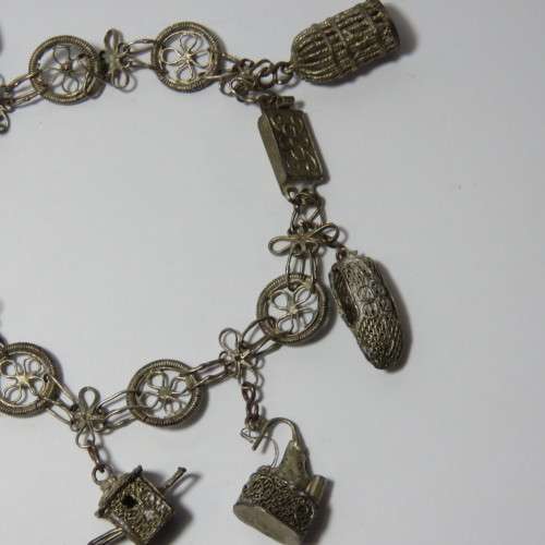Low Grade silver filigree charm bracelet