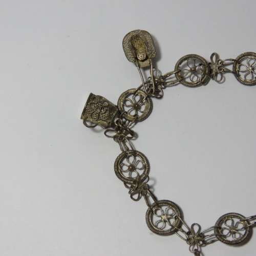 Low Grade silver filigree charm bracelet