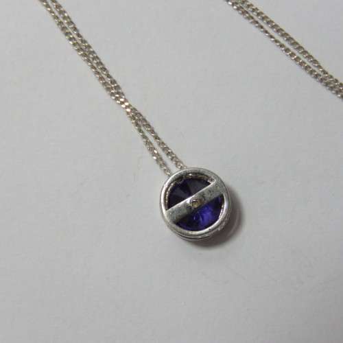 Sterling silver necklace with purple stone pendant - Weighs 1,9 grams - Length 25 cm (closed)