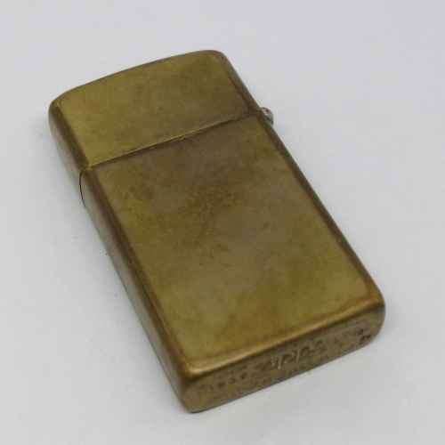 1992 Solid brass slim line zippo - J.L Douglas engraved