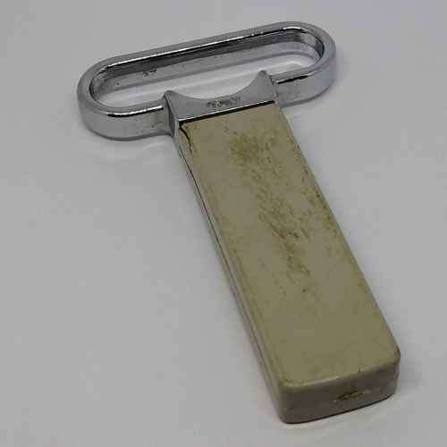 Vintage bottle opener and cork puller