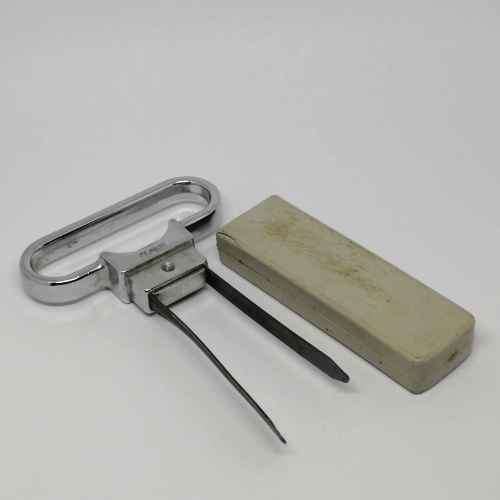 Vintage bottle opener and cork puller